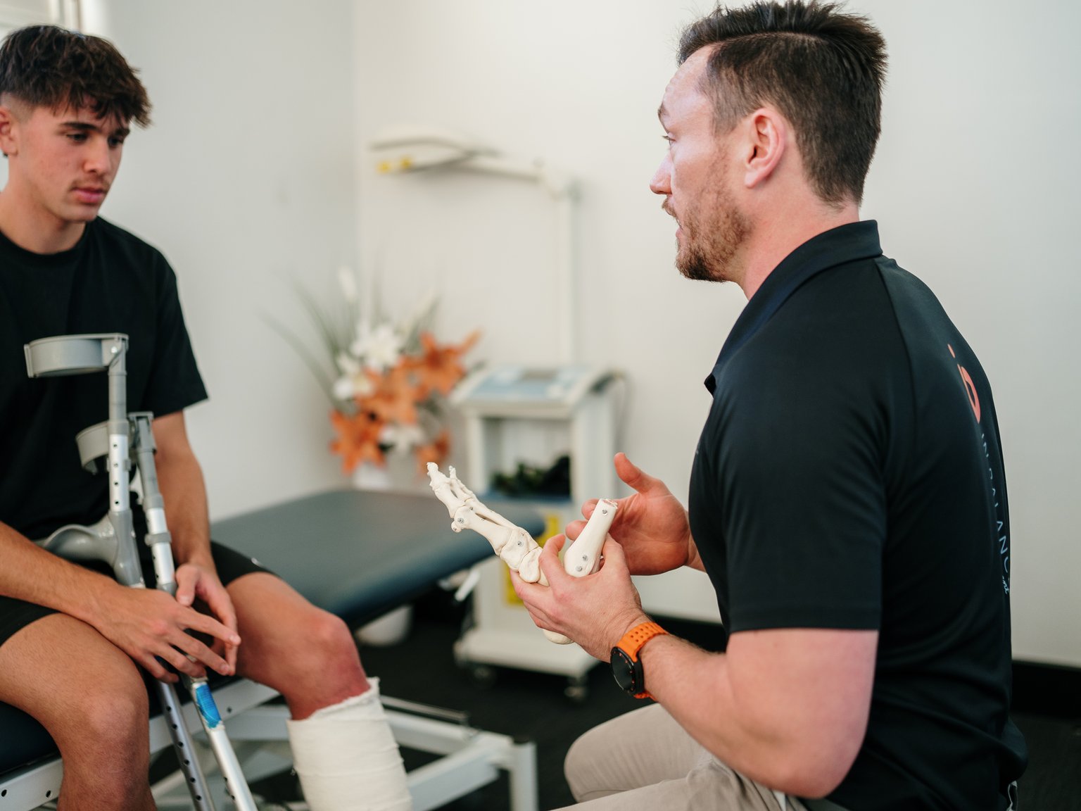Physio working with client